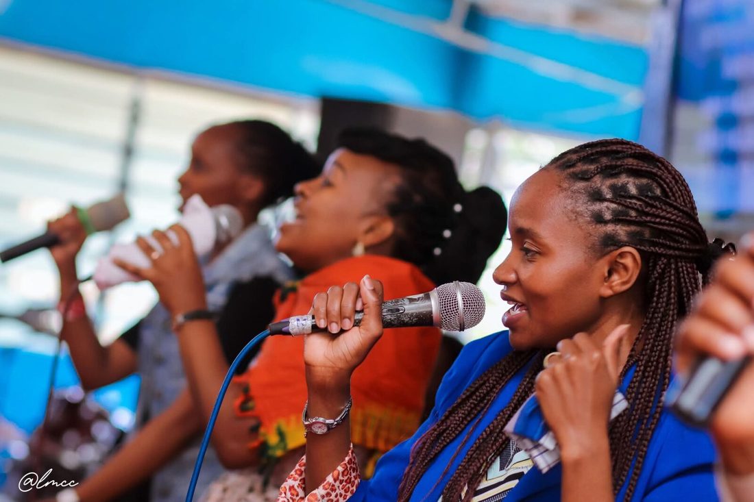 Church choir singing with all their hearts